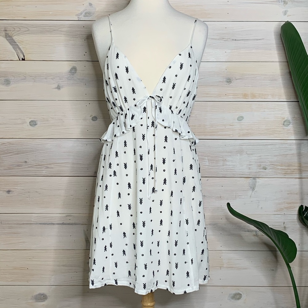 Short White Dress with Black Geometric Stitched Detail